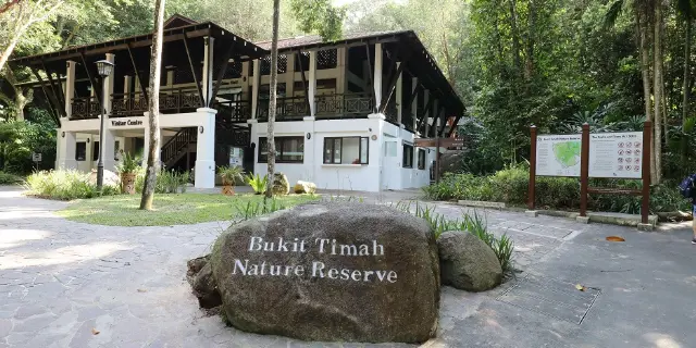 The Bukit Timah Nature Reserve visitor centre behind the reserve’s name stone